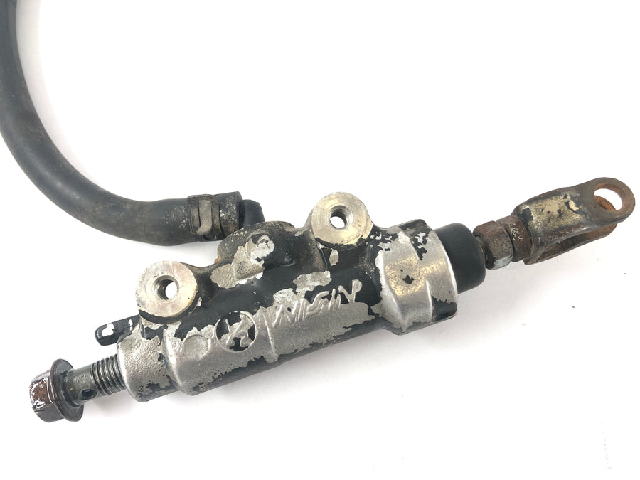 Yamaha DT 125 4BL [1999] - Bromspump bakom
