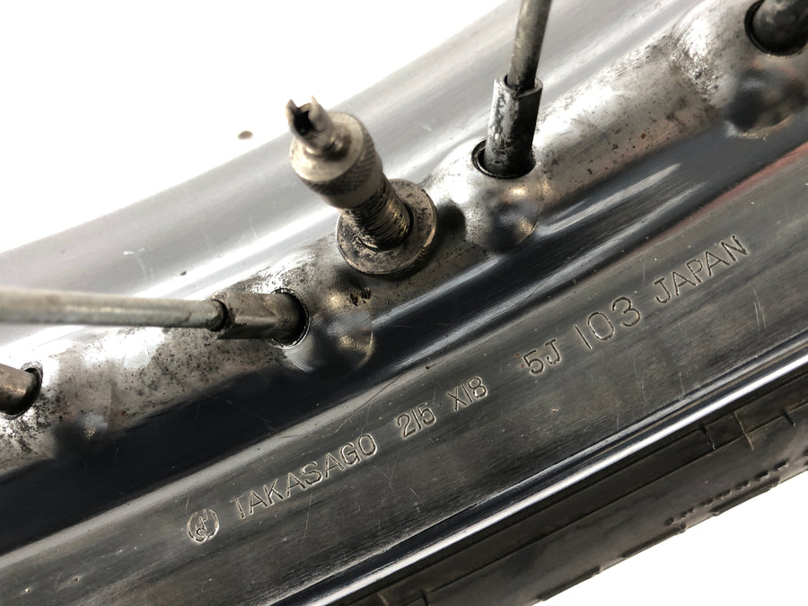 Suzuki T 500 [GT 500] - bakhjulskanten bakom